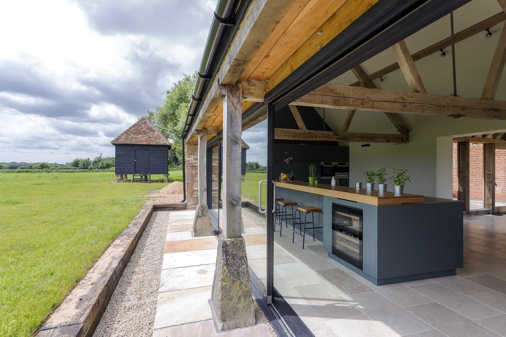 Landscaped lawn surrounding a converted rural property