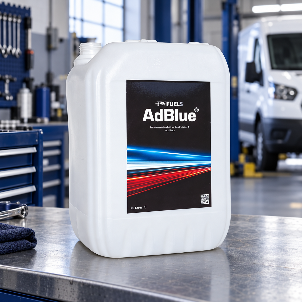 TW Fuels 20L AdBlue container on a commercial vehicle workshop bench